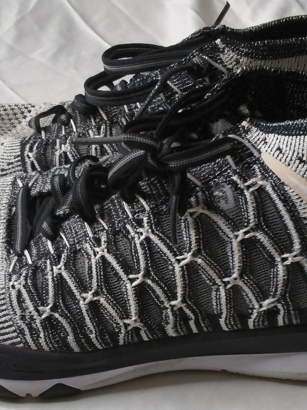 Nike Black and White Flyknit Running Shoes